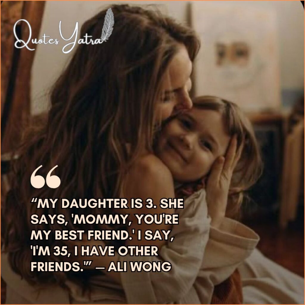 A close-up of a mother kissing her smiling daughter, accompanying funny Daughter Quotes from Mom. Text quote: Ali Wong on being her three-year-old's best friend.