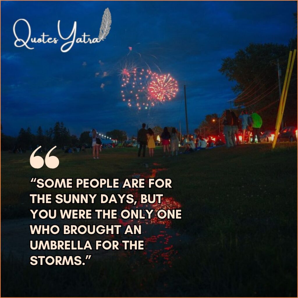 Crowd watching fireworks at night with a gratitude quote about people who bring umbrellas for storms.