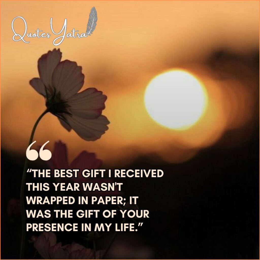 Silhouette of a flower against a warm sunset bokeh with a message about the gift of presence.