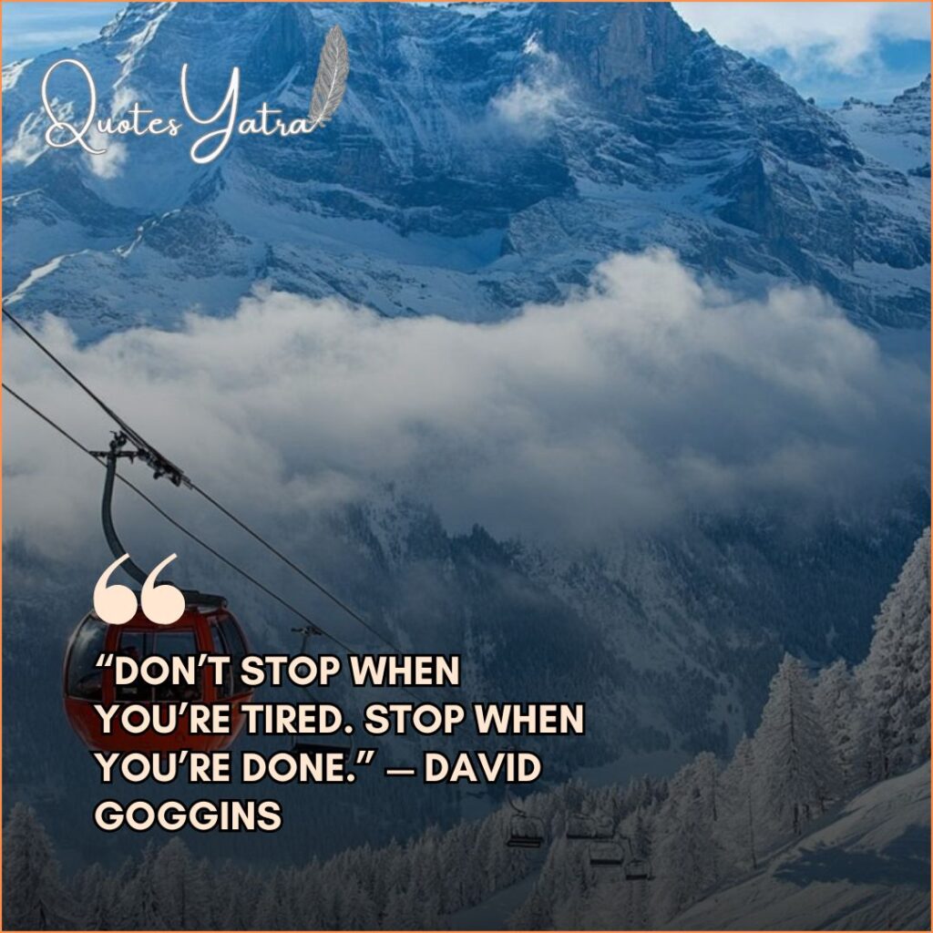Red cable car gondola moving over snowy mountains with a David Goggins quote about not stopping when tired.