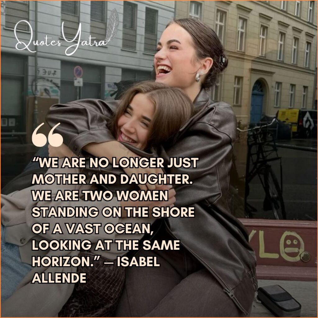 Two adult women, mother and daughter, sitting together laughing, representing adult friendship and mutual recognition.