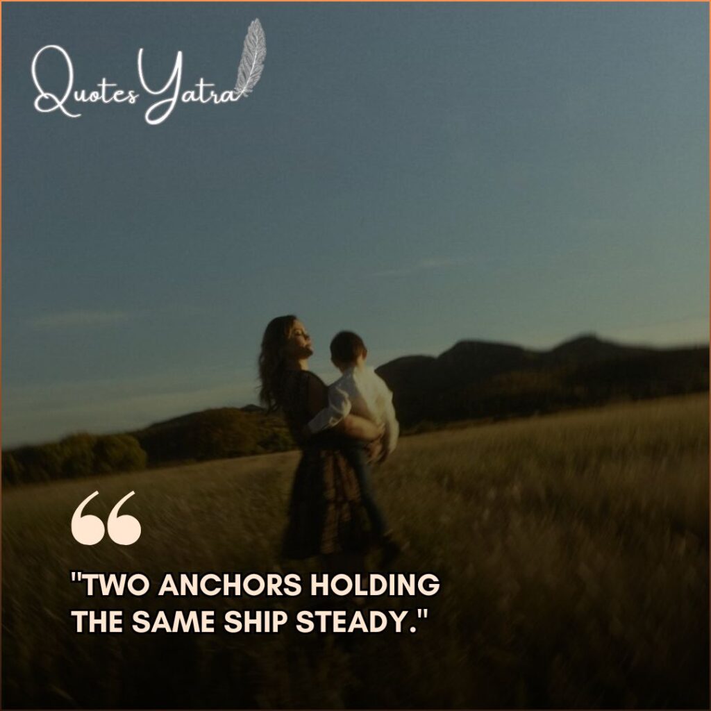 Mother holding her young son outdoors on a grassy hillside, visually representing the short, sweet phrase about parents acting as two anchors holding the ship steady.