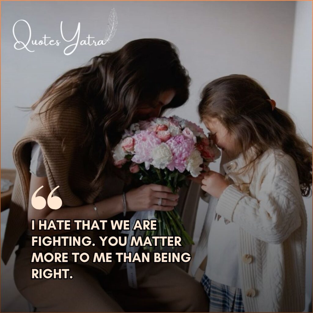 A young daughter and her mother holding flowers together during a gentle emotional moment.