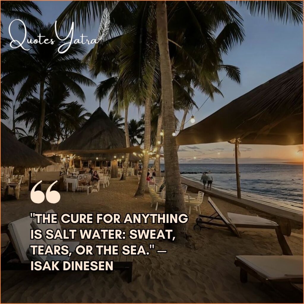 Tropical beach resort with palm trees at sunset featuring a quote by Isak Dinesen about the sea.