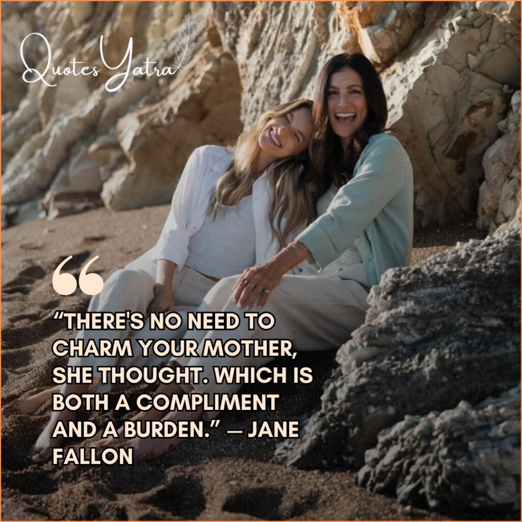 A grown daughter sitting beside her smiling mother near rocky cliffs, sharing a joyful moment.