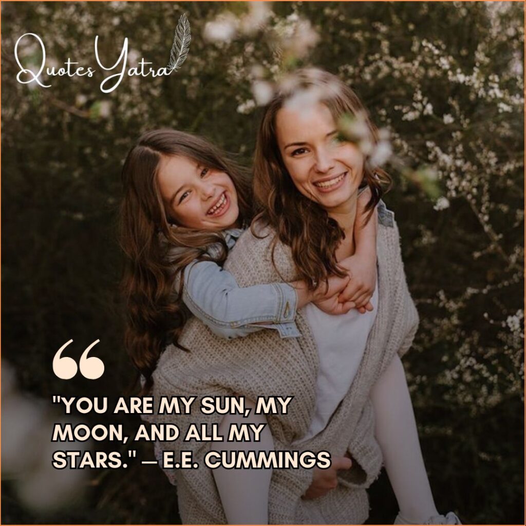 A mother smiling while her daughter hugs her from behind in a natural outdoor setting.
