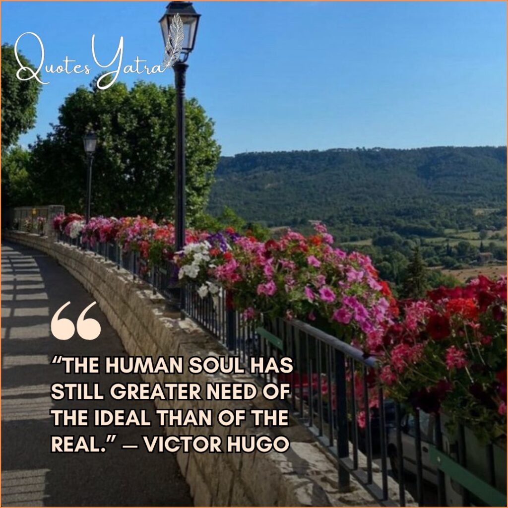 Flower-lined hillside walkway under a clear blue sky, featuring a Victor Hugo quote about the ideal and imagination.