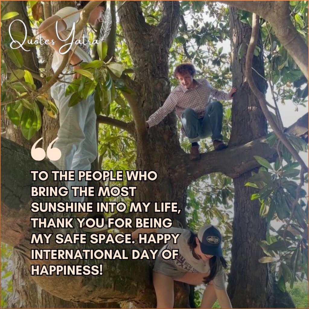 Friends sitting together in a tree sharing joyful International Day of Happiness message