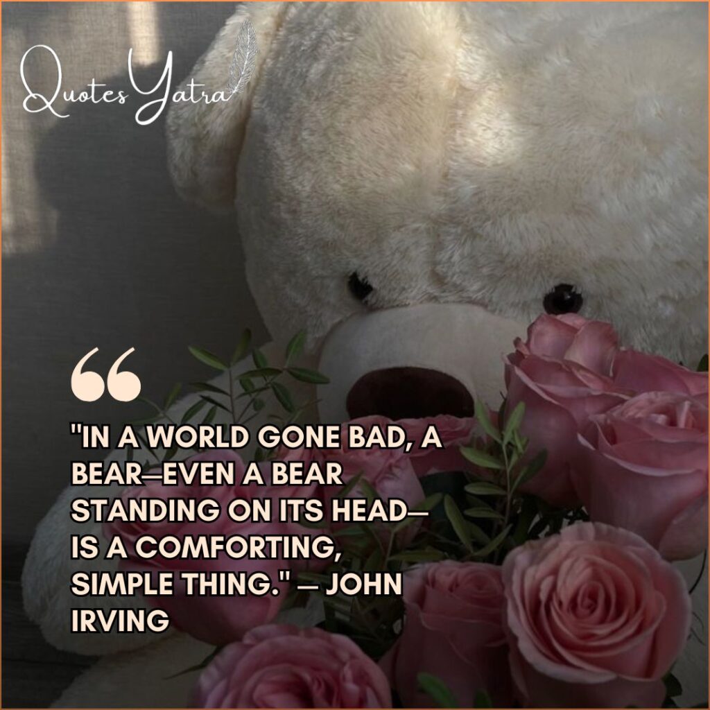 A close-up artistic shot of a white teddy bear's face with pink roses in the foreground.